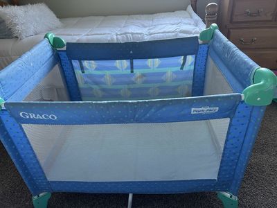 Two Portable Cribs