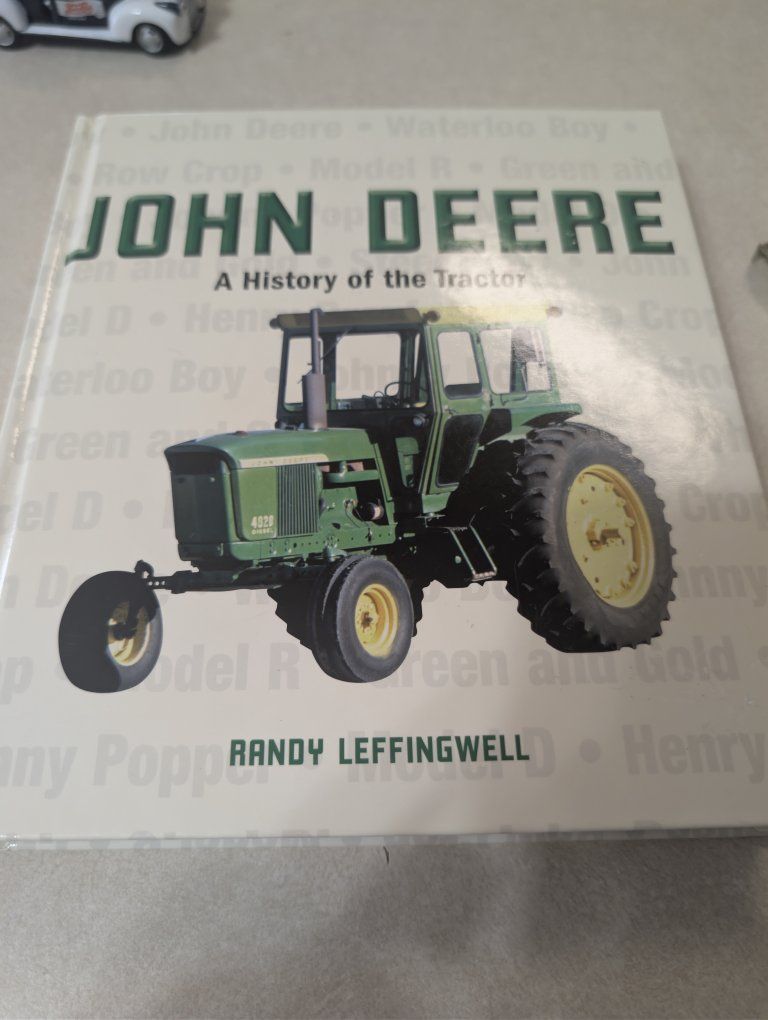 vintage John deer tractor with trailer. like new condition used as display