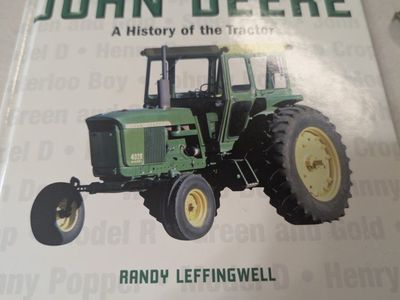 vintage John deer tractor with trailer. like new condition used as display