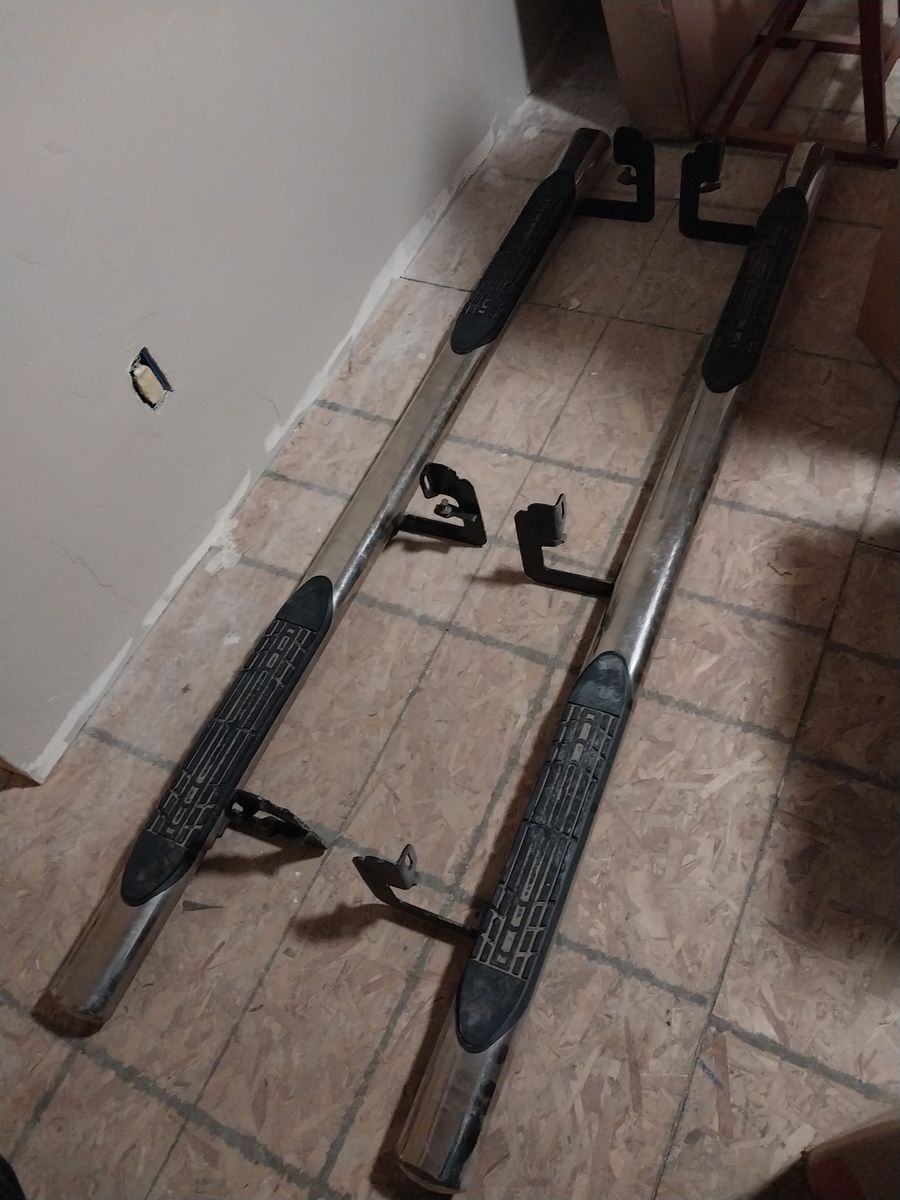 A pair of side step nerf bars for a 2006 Chevy Silverado 2500 / 2500HD (Left & Right set).