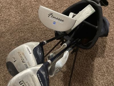 Leftover yard sale itemsJunior Golf Club Set with Stand Bag