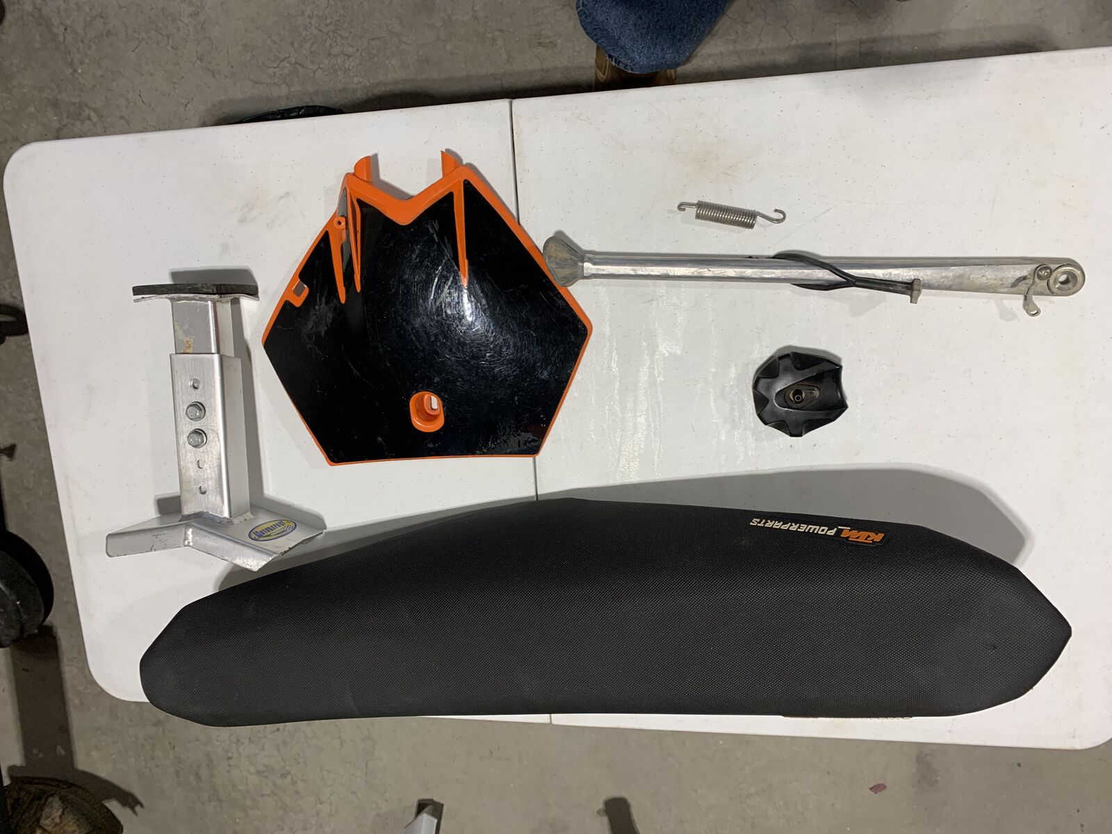 Dirt Bike parts and Accessories - Tubliss Kickstand Seat Fork saver Sprocket Foot Pegs and more