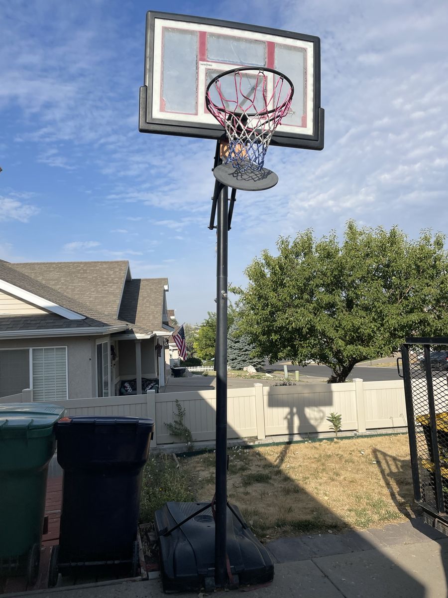 Portable Outdoor Basketball Hoop with Adjustable Height Pole and Base
