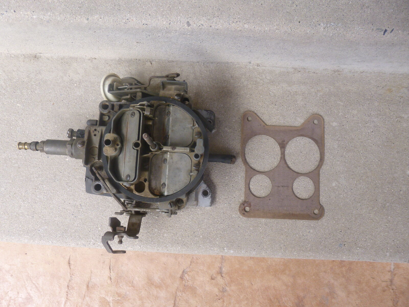 Pre owned Rochester four barrel carburetor off a GM small block