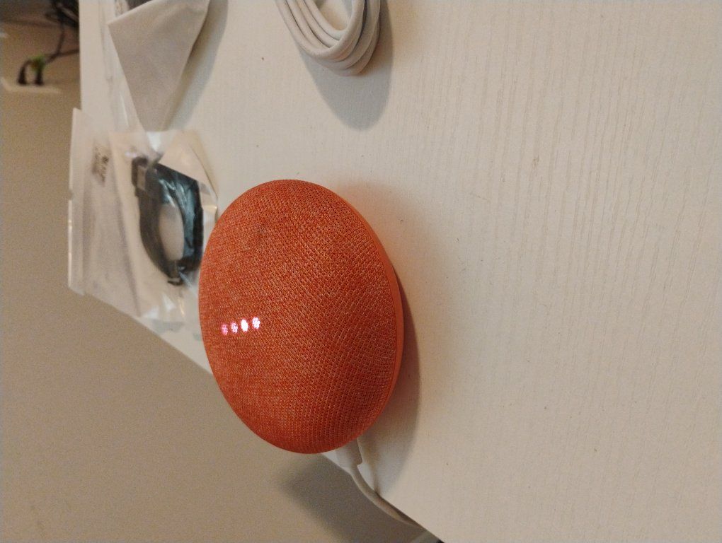 Google mini home speaker with iPhone charger, etc;