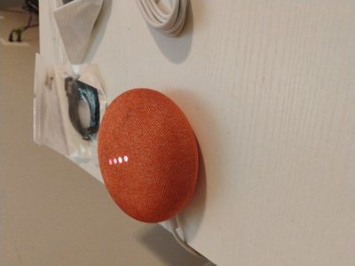Google mini home speaker with iPhone charger, etc;