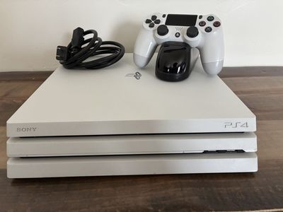 Sony PlayStation 4 (PS4) Pro Glacier White Console, Controller, & Charging Dock