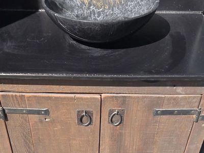 Rustic Wood Vanity Cabinet with Black Countertop & Decorative Bowl Sink - Farmhouse Style