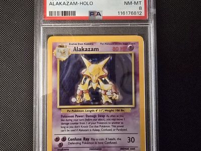 1999 Pokemon Game #1 Alakazam-Holo PSA NM-MT 8 - Graded & Authenticated Trading Card