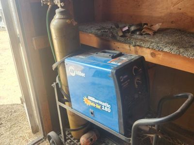 Miller Millermatic Auto-Set 180 MIG Welder with Cart, Argon Gas Tank, and a new spool of wire