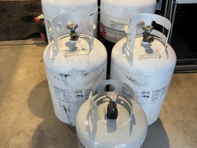 5 Filled Propane Gas Tanks