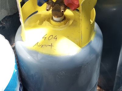 Refrigerant tank