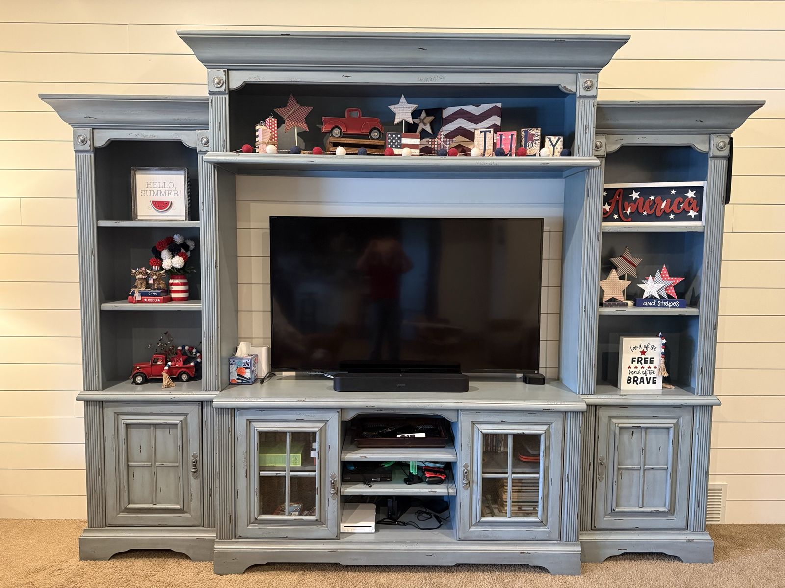 Large Blue Distressed Entertainment Center with Media Storage and Shelving