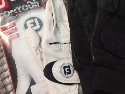 Brand new left handed glove, a right glove and winter gloves.