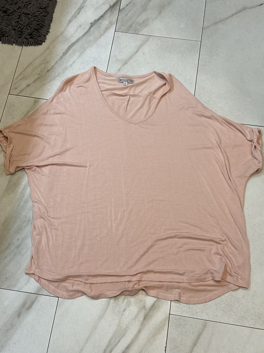 Size XL shirt fits more like XXL