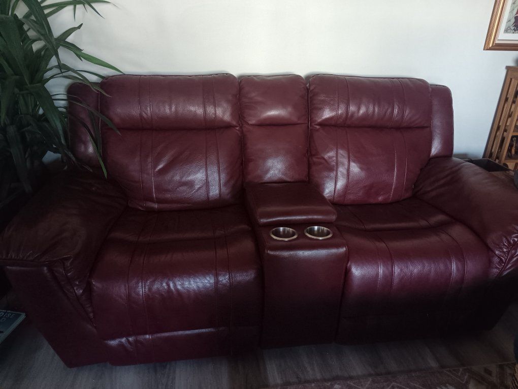 Burgundy Faux Leather Reclining Loveseat with Center Console & Cup Holders