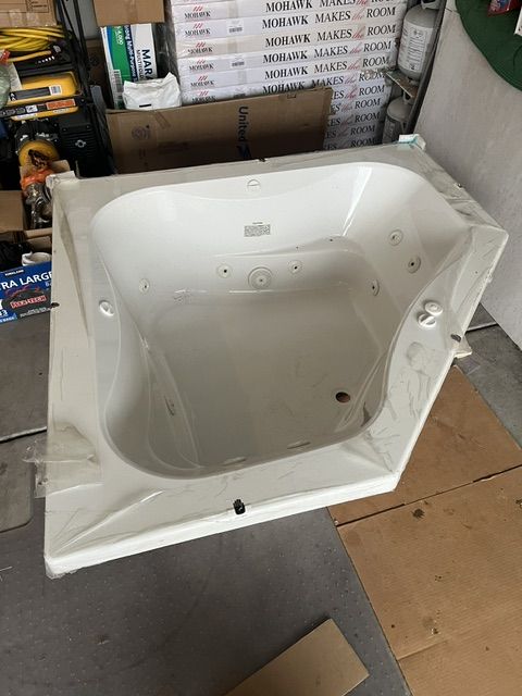 Jacuzzi jetted tub, new with water heater