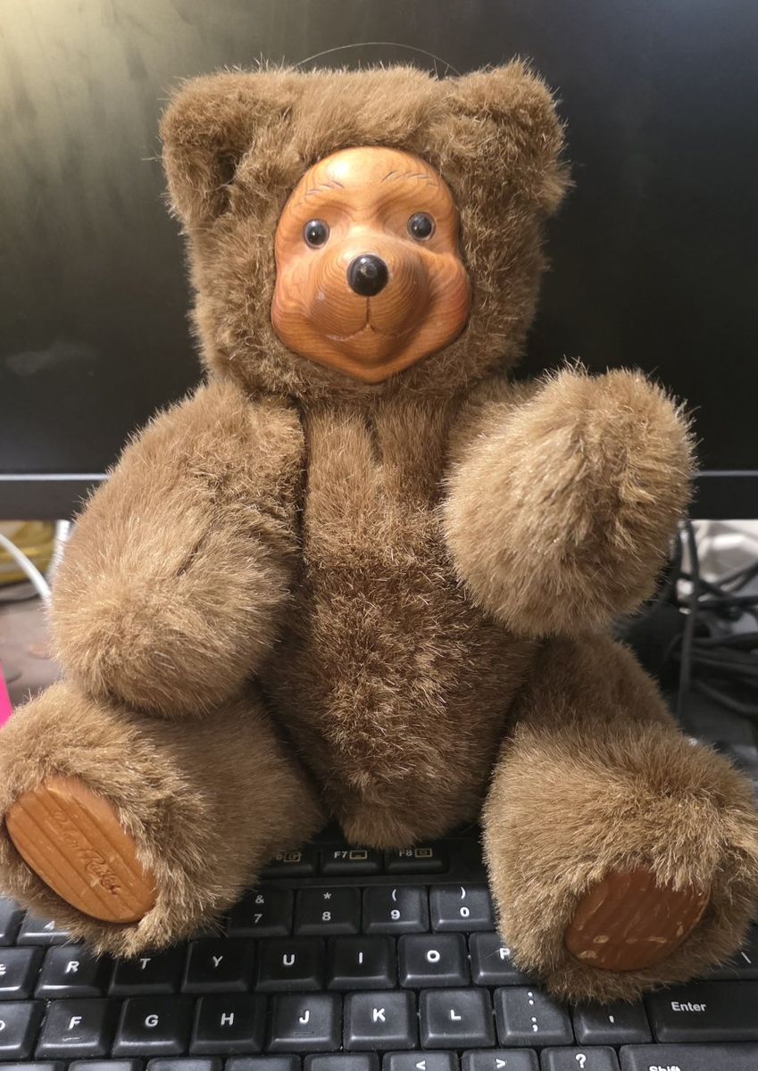 wooden plush wooden faced bear