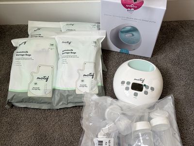 Spectra S1 Breast Pump (new) And MilK Storage Bags