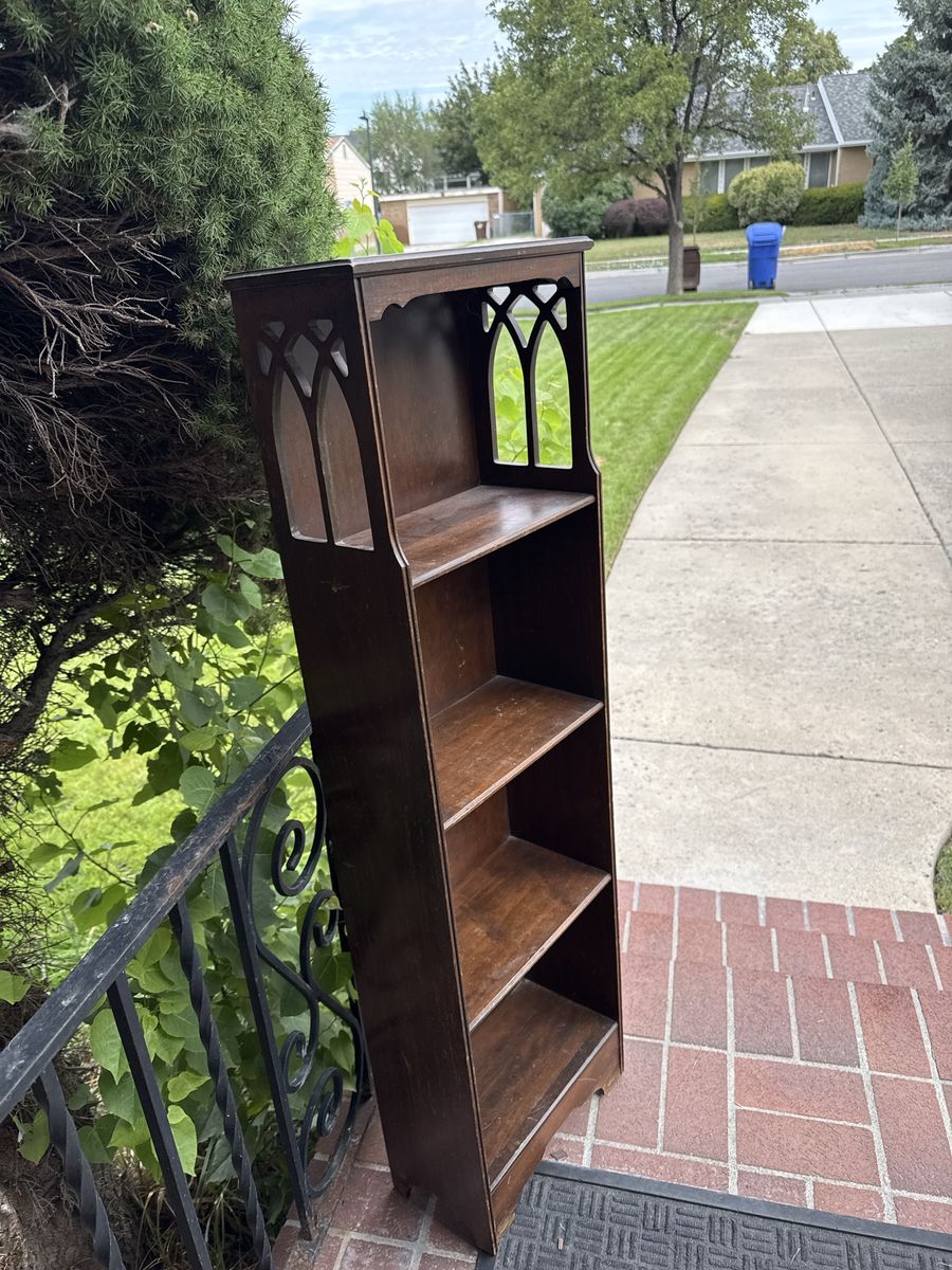 Vintage Wooden Bookshelf with Gothic Cutout Arch Details