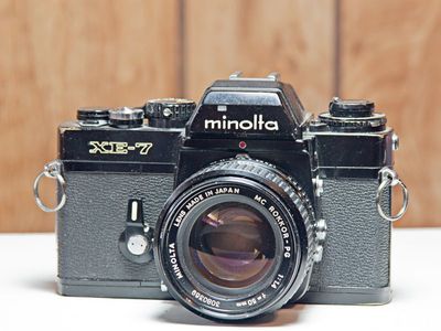 Minolta XE-7 w/Minolta 50mm f/1.7 MC Rokkor-X PF Lens, 55mm "Pro" UV Filter. No Lens Caps. Has One Obvious Issue.