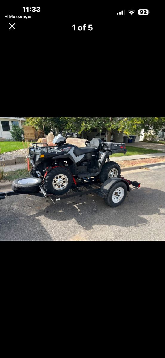 Utility trailer with ramps 