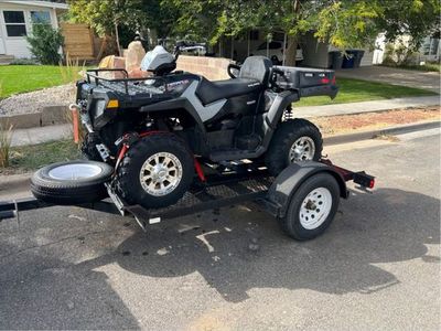 Utility trailer with ramps