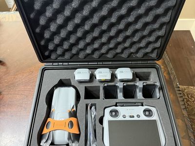 DJI Air 3 Drone with Controller and Hard Carrying Case and Backpack.