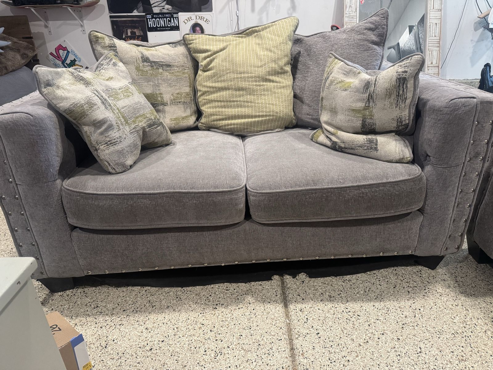Gray Love Seat Sofa with Nailhead Trim and 5 Throw Pillows - Used Good Condition