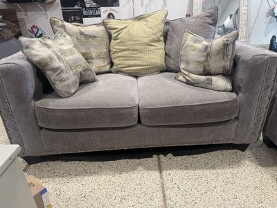 Gray Love Seat Sofa with Nailhead Trim and 5 Throw Pillows - Used Good Condition