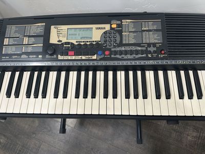 Yamaha keyboard with stand