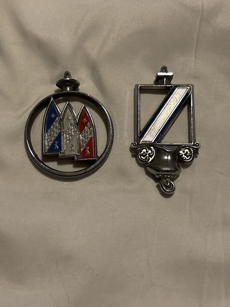 2 vintage Buick hood ornaments