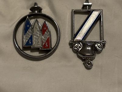 2 vintage Buick hood ornaments