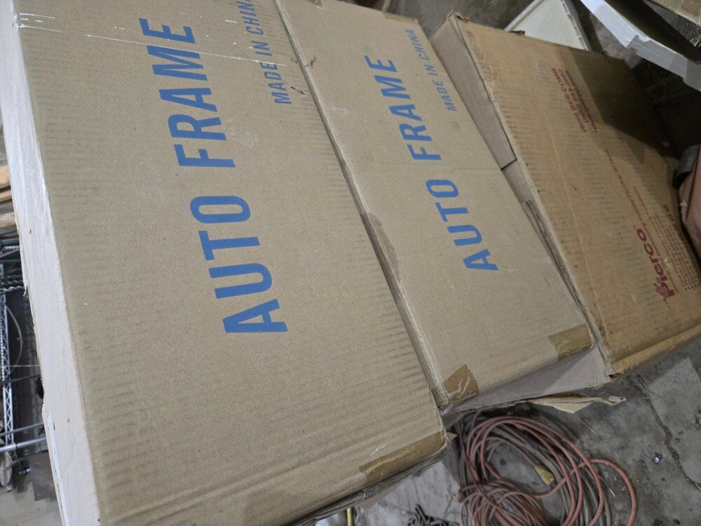 2 full boxes of auto frames