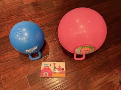Two Hopper Balls for kids with pump to inflate them. Hop-Along Bouncy Exercise