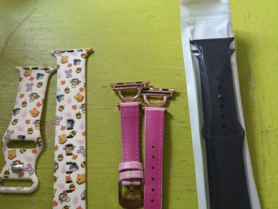 Assorted Apple Watch Bands & Charger - Winnie the Pooh, Pink Leather, Black Silicone bundle series 10 Apple Watch band 42 mm