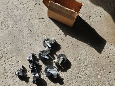 Box of casters. Never used.