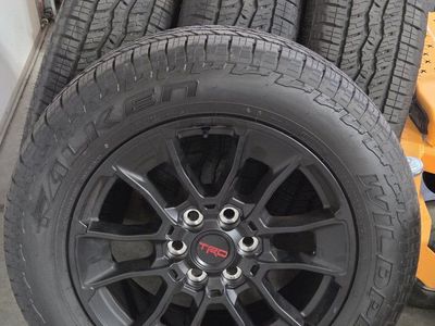 Set of 4 Falken Wildpeak A/T3W 265/60R20 Tires on Black TRD Wheels