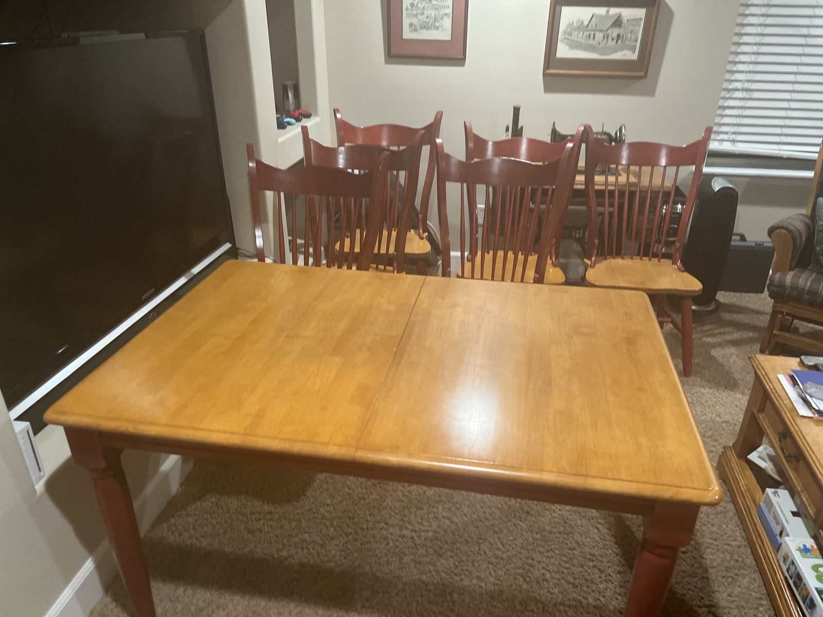 Heavy wood table and 6 chairs.    54 x 36