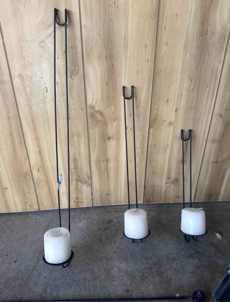 Indoor/outdoor hanging candle wall holders