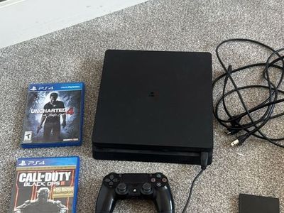 PS4 Slim Bundle – Console + 2 Controllers + Games + External Hard Drive