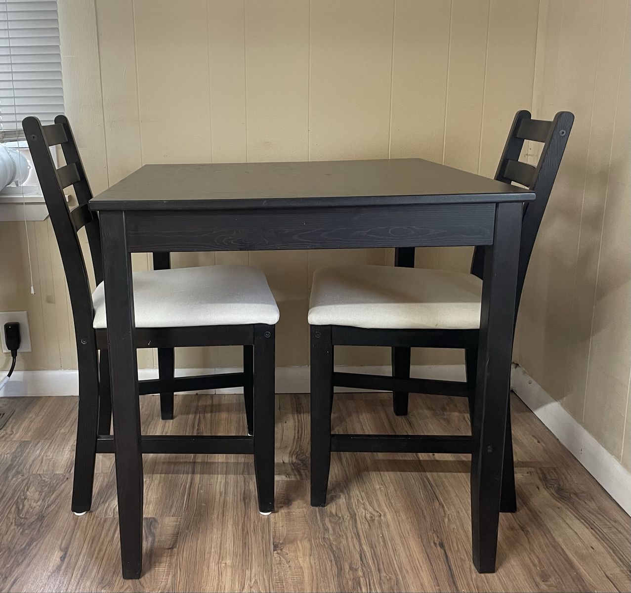 Compact Black Dining Table with 2 Chairs - 28"H x 29"W, Cream Seats