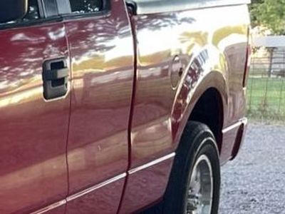 Undercover brand tonneau cover for 2004 to 2008 Ford F150. 6.5 foot bed.