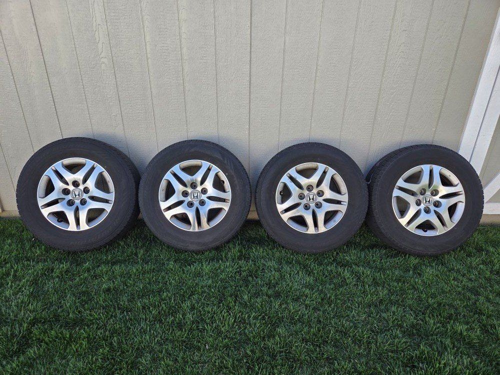 235/65R16 Mazama Reputation Tires on Alloy Wheels