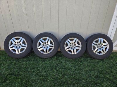 235/65R16 Mazama Reputation Tires on Alloy Wheels