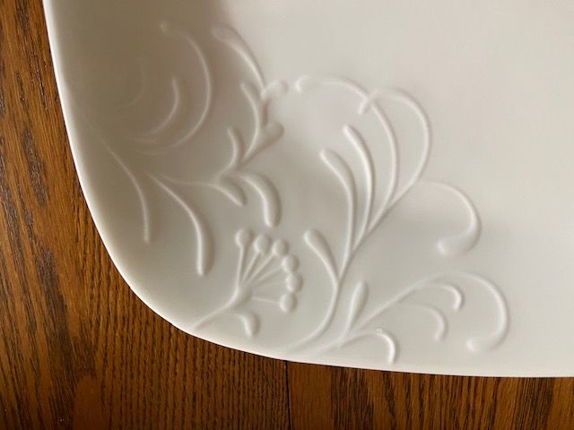 Like New!  Set of 16 Corelle dinner ware set.  White with leaf pattern design.  4 dinner, 4 lunch, 4 dessert plates, 4 bowls