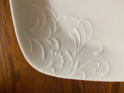 Like New! Set of 16 Corelle dinner ware set. White with leaf pattern design. 4 dinner, 4 lunch, 4 dessert plates, 4 bowls