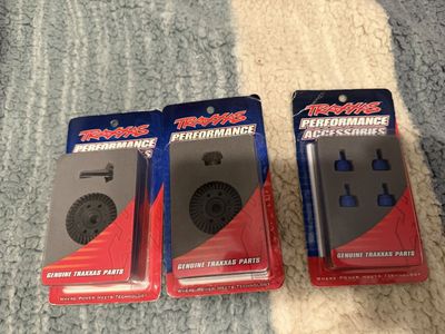 Traxxas Performance RC Car Parts: 5379R, 6879R Gear Sets & 3767A Blue Anodized Shock Caps $40 for all