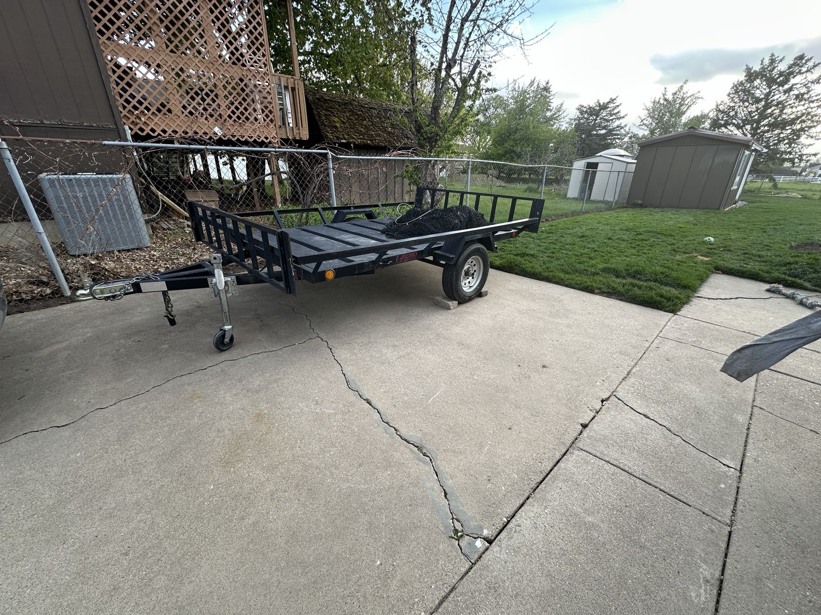 Echo Trailers Black Single Axle Utility Trailer with Rail Sides