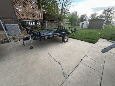 Echo Trailers Black Single Axle Utility Trailer with Rail Sides